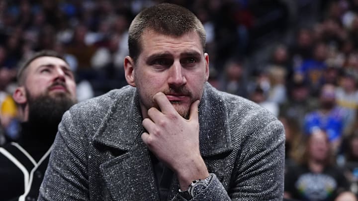 Jan 18, 2026; Denver, Colorado, USA; Denver Nuggets center Nikola Jokic (15) on the bench in the third quarter against the Charlotte Hornets at Ball Arena. Mandatory Credit: Ron Chenoy-Imagn Images