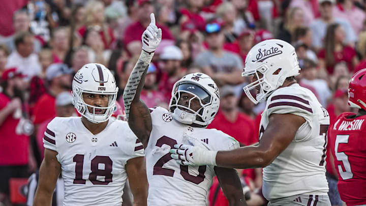 Mississippi State Bulldogs running back Johnnie Daniels (20) reacts after scoring a touchdown against the Georgia Bulldogs during the second half at Sanford Stadium. Mississippi State Bulldogs running back Johnnie Daniels (20) reacts after scoring a touchdown against the Georgia Bulldogs during the second half at Sanford Stadium.