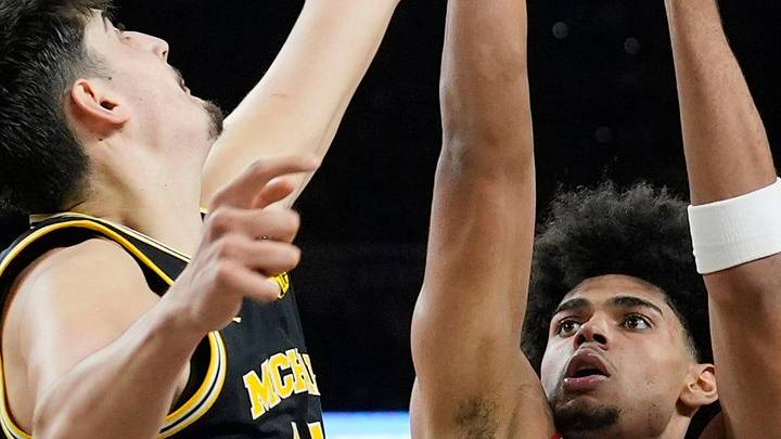 Michigan center Aday Mara (15) blocks Arizona forward Koa Peat (10) shot in the second half of their Final Four game at Lucas Oil Stadium in Indianapolis on Saturday, April 4, 2026.