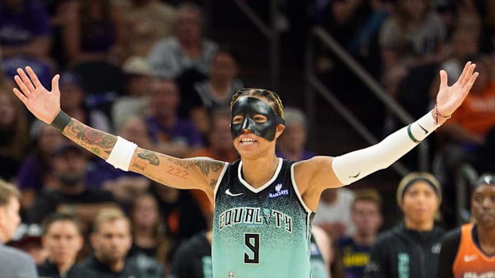 Sep 14, 2025; Phoenix, Arizona, USA; New York Liberty guard Natasha Cloud (9) reacts as her team pulls away during overtime against the Phoenix Mercury during game one of the 2025 WNBA Playoffs round one at PHX Arena. Mandatory Credit: Allan Henry-Imagn Images