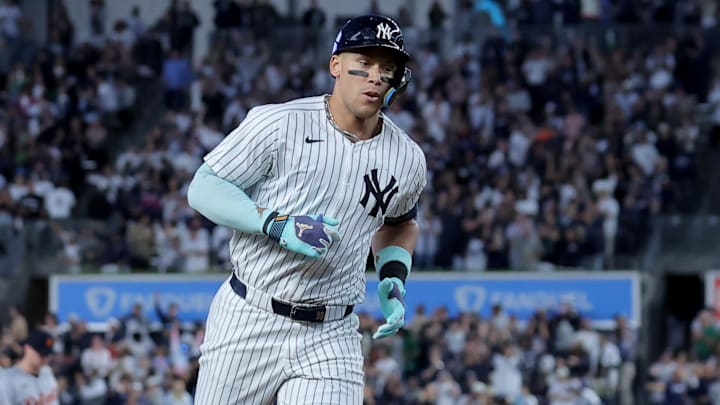 Sep 9, 2025; Bronx, New York, USA; New York Yankees right fielder Aaron Judge (99) rounds the bases after hitting a solo home run against the Detroit Tigers during the first inning at Yankee Stadium. Mandatory Credit: Brad Penner-Imagn Images