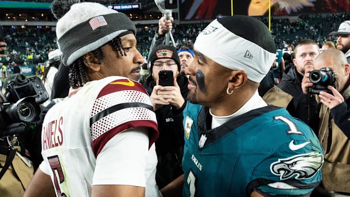 Nov 14, 2024; Philadelphia, Pennsylvania, USA; Philadelphia Eagles quarterback Jalen Hurts (1) and Washington Commanders quarterback Jayden Daniels (5) shake hands after an Eagles victory at Lincoln Financial Field. Mandatory Credit: Bill Streicher-Imagn Images