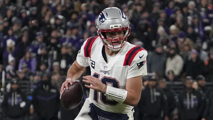 Dec 21, 2025; Baltimore, Maryland, USA;  New England Patriots halfback Drake Maye (10) runs the ball against the Baltimore Ravens during the first half of the game at M&T Bank Stadium. Mandatory Credit: James Lang-Imagn Images