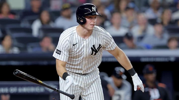 Sep 11, 2025; Bronx, New York, USA; New York Yankees catcher Ben Rice (22) follows through on an RBI double against the Detroit Tigers during the second inning at Yankee Stadium. Mandatory Credit: Brad Penner-Imagn Images