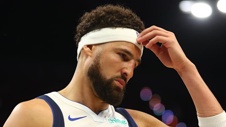 Oct 26, 2024; Phoenix, Arizona, USA; Dallas Mavericks guard Klay Thompson (31) reacts against the Phoenix Suns at Footprint Center. Mandatory Credit: Mark J. Rebilas-Imagn Images