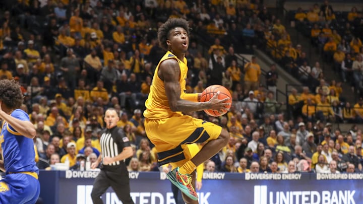 Nov 13, 2025; Morgantown, West Virginia, USA; West Virginia Mountaineers guard Honor Huff (3) makes a move in the lane and shoots during the second half against the Pittsburgh Panthers at WVU Coliseum. Mandatory Credit: Ben Queen-Imagn Images