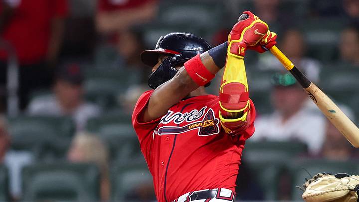 Aug 28, 2026; Atlanta, Georgia, USA; Atlanta Braves right fielder Ronald Acuna Jr. (13) hits a double against the Colorado Rockies in the fifth inning at Truist Park. Mandatory Credit: Brett Davis-Imagn Images