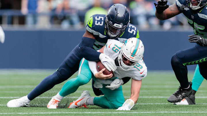 Sep 22, 2024; Seattle, Washington, USA; Seattle Seahawks linebacker Boye Mafe (53) sacks Miami Dolphins quarterback Skylar Thompson (19) during the second quarter at Lumen Field. Mandatory Credit: Kevin Ng-Imagn Images