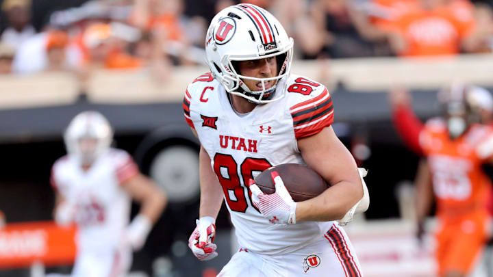 Utah's Dallen Bentley (88) walks into the end zone for a score against the Oklahoma State University Cowboys.