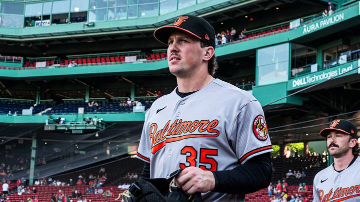 Jun 3, 2026; Boston, Massachusetts, USA; Baltimore Orioles catcher Adley Rutschman (35) and field coordinator/catching coach Joe Singley (87) walk to the bullpen before the start of the game against the Boston Red Sox at Fenway Park. Mandatory Credit: David Butler II-Imagn Images Jun 3, 2026; Boston, Massachusetts, USA; Baltimore Orioles catcher Adley Rutschman (35) and field coordinator/catching coach Joe Singley (87) walk to the bullpen before the start of the game against the Boston Red Sox at Fenway Park. Mandatory Credit: David Butler II-Imagn Images