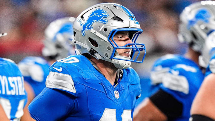 Detroit Lions tight end Zach Horton (40), center, runs off the field after a play against Houston Texans