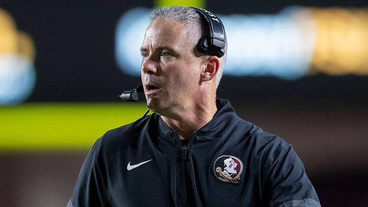Florida State Seminoles head coach Mike Norvell talks into his headset during a timeout. The Florida State Seminoles defeated the New Mexico State Aggies 34-17 at Doak Campbell Stadium on Saturday, Aug. 29, 2026. Florida State Seminoles head coach Mike Norvell talks into his headset during a timeout. The Florida State Seminoles defeated the New Mexico State Aggies 34-17 at Doak Campbell Stadium on Saturday, Aug. 29, 2026.