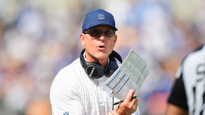 Oct 19, 2025; Inglewood, California, USA; Los Angeles Chargers head coach Jim Harbaugh reacts in the first half against the Indianapolis Colts at SoFi Stadium. Mandatory Credit: Gary A. Vasquez-Imagn Images