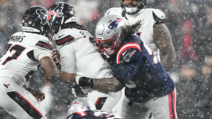 Jan 18, 2026; Foxborough, MA, USA; New England Patriots defensive lineman Khyiris Tonga (95) sacks Houston Texans quarterback C.J. Stroud (7) in the fourth quarter in an AFC Divisional Round game at Gillette Stadium. Mandatory Credit: Brian Fluharty-Imagn Images