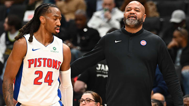 Mar 19, 2026; Washington, District of Columbia, USA; Detroit Pistons head coach J.B. Bickerstaff talks with guard Daniss Jenkins (24) against the Washington Wizards during the first half at Capital One Arena.