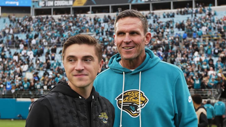 Jan 4, 2026; Jacksonville, Florida, USA; Jacksonville Jaguars general manager James Gladstone (left) and executive vice president of football operations Tony Boselli stand on the field after the game against the Tennessee Titans at EverBank Stadium. Mandatory Credit: Travis Register-Imagn Images