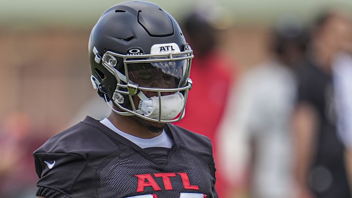 Former Atlanta Falcons wide receiver Rondale Moore (14) runs with the ball during Falcons OTA at the Falcons Training facility.