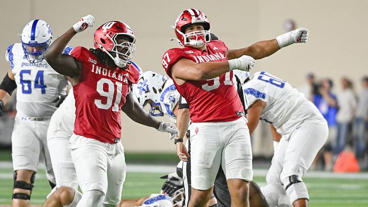Sep 12, 2025; Bloomington, Indiana, USA; Indiana Hoosiers defensive lineman Dominique Ratcliff (91) and Indiana Hoosiers defensive lineman Mario Landino (97) celebrate after a sack during the second half against the Indiana State Sycamores at Memorial Stadium. Mandatory Credit: Robert Goddin-Imagn Images Sep 12, 2025; Bloomington, Indiana, USA; Indiana Hoosiers defensive lineman Dominique Ratcliff (91) and Indiana Hoosiers defensive lineman Mario Landino (97) celebrate after a sack during the second half against the Indiana State Sycamores at Memorial Stadium. Mandatory Credit: Robert Goddin-Imagn Images