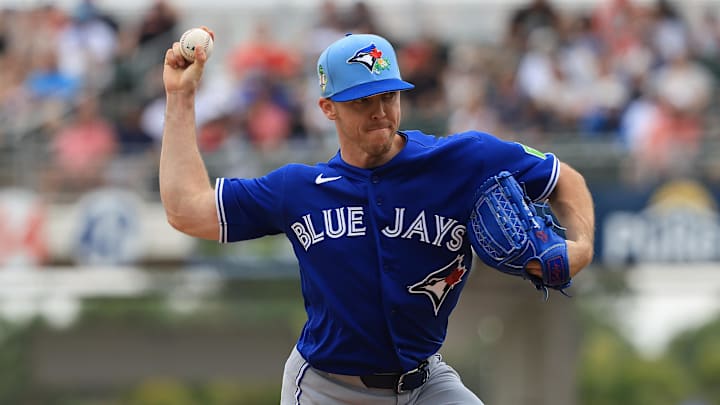 Chase Lee delivers a throw to the plate. 