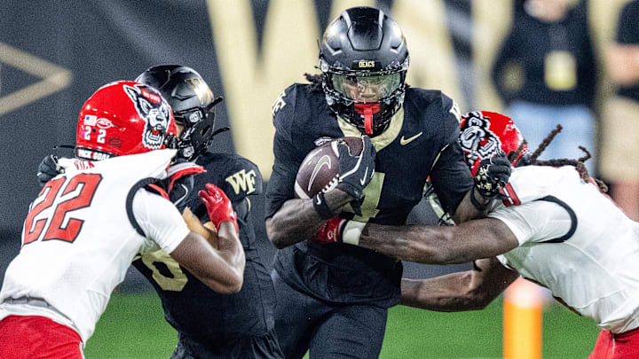 Sep 11, 2025; Winston-Salem, North Carolina, USA;  Wake Forest Demon Deacons wide receiver Sterling Berkhalter (4) catches a pass in the first half against North Carolina State Wolfpack at Allegacy Federal Credit Union Stadium. Mandatory Credit: Luke Jamroz-Imagn Images
