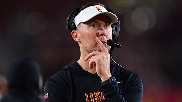 Nov 7, 2025; Los Angeles, California, USA; Southern California Trojans head coach Lincoln Riley watches game action against the Northwestern Wildcats during the second half at the Los Angeles Memorial Coliseum. Mandatory Credit: Gary A. Vasquez-Imagn Images