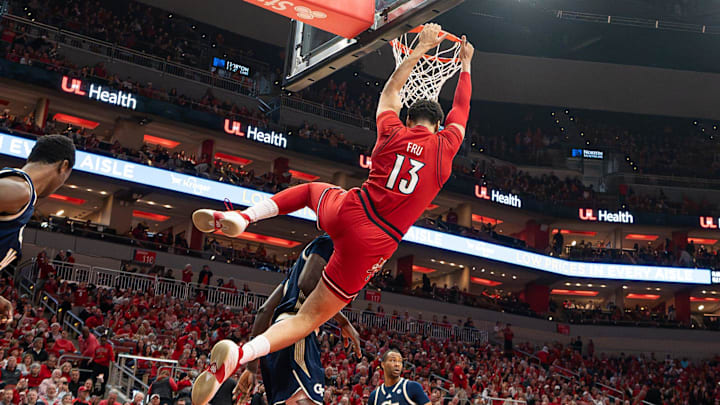 Louisville Cardinals forward Sananda Fru (13) slams down two points as the Louisville Cardinals host the Georgia Tech Yellow Jackets in an NCAA basketball game at the KFC Yum! Center, Saturday, Feb. 21, 2026, in Louisville. Louisville Cardinals forward Sananda Fru (13) slams down two points as the Louisville Cardinals host the Georgia Tech Yellow Jackets in an NCAA basketball game at the KFC Yum! Center, Saturday, Feb. 21, 2026, in Louisville.