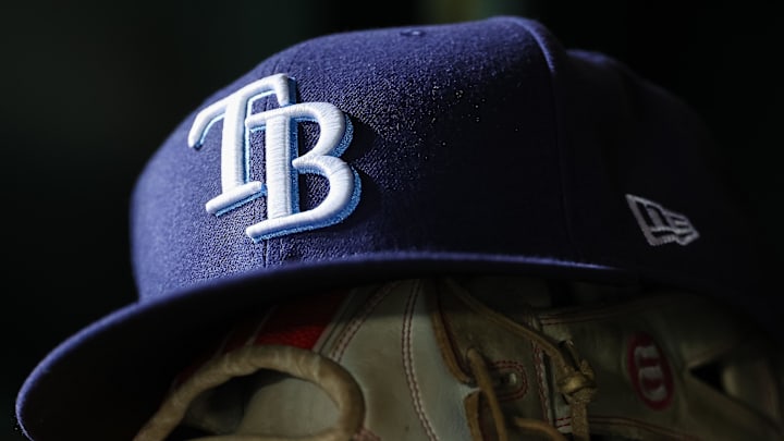 Apr 3, 2023; Washington, District of Columbia, USA; A general view of a Tampa Bay Rays hat and glove during the seventh inning of the game against the Washington Nationals at Nationals Park. Apr 3, 2023; Washington, District of Columbia, USA; A general view of a Tampa Bay Rays hat and glove during the seventh inning of the game against the Washington Nationals at Nationals Park.