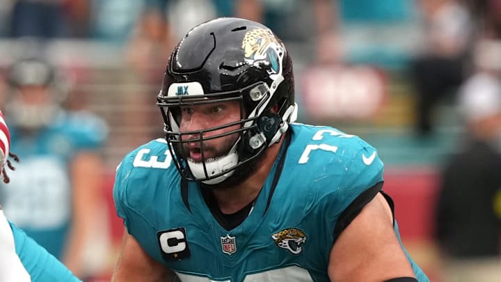 Sep 28, 2025; Santa Clara, California, USA; Jacksonville Jaguars center Robert Hainsey (73) blocks San Francisco 49ers middle linebacker Fred Warner (left) during the fourth quarter at Levi's Stadium. Mandatory Credit: Darren Yamashita-Imagn Images