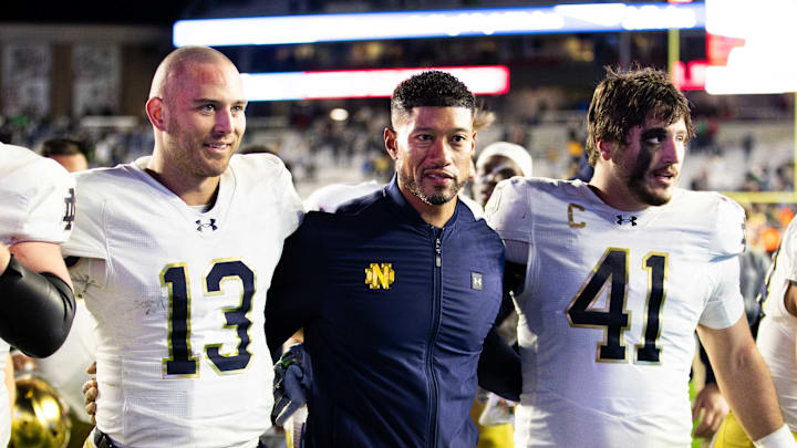 Nov 1, 2025; Chestnut Hill, Massachusetts, USA; Notre Dame Fighting Irish head coach Marcus Freeman, Notre Dame Fighting Irish quarterback CJ Carr (13) and Notre Dame Fighting Irish defensive lineman Donovan Hinish (41) after the game against the Boston College Eagles at Alumni Stadium. 