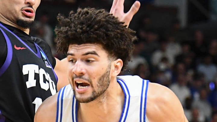 TCU Horned Frogs forward David Punch (15) defends Duke Blue Devils forward Cameron Boozer (12) Saturday, March 21, 2026, during the NCAA Men’s Basketball Tournament second round game at Bon Secours Wellness Arena in Greenville, South Carolina.