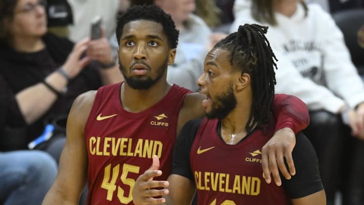 Apr 12, 2024; Cleveland, Ohio, USA; Cleveland Cavaliers guard Donovan Mitchell (45) and guard Darius Garland (10) talk in the fourth quarter against the Indiana Pacers at Rocket Mortgage FieldHouse. Mandatory Credit: David Richard-Imagn Images