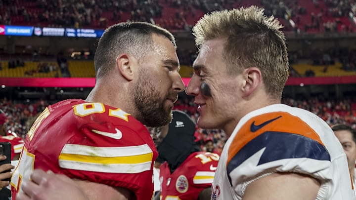 Dec 25, 2025; Kansas City, Missouri, USA; Denver Broncos quarterback Bo Nix (10) and Kansas City Chiefs tight end Travis Kelce (87) after the game at GEHA Field at Arrowhead Stadium. Mandatory Credit: Denny Medley-Imagn Images