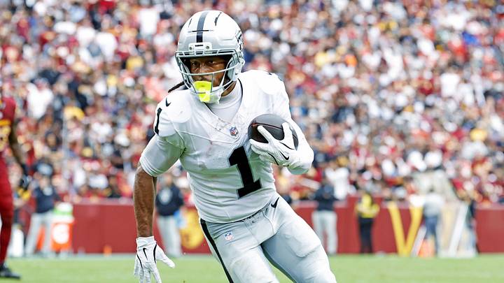 Sep 21, 2025; Landover, Maryland, USA; Las Vegas Raiders wide receiver Tre Tucker (1) runs a touchdown pass during the second half against the Washington Commanders at Northwest Stadium. Mandatory Credit: Amber Searls-Imagn Images Sep 21, 2025; Landover, Maryland, USA; Las Vegas Raiders wide receiver Tre Tucker (1) runs a touchdown pass during the second half against the Washington Commanders at Northwest Stadium. Mandatory Credit: Amber Searls-Imagn Images