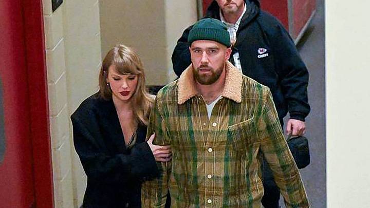 Taylor Swift and Travis Kelce leaving a venue together. Taylor Swift and Travis Kelce leaving a venue together.