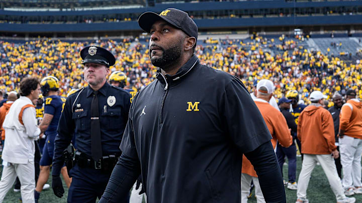Sherrone Moore will miss two games in the upcoming season after Michigan self-imposed the suspension.