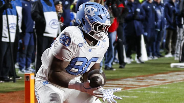 Nov 29, 2025; Raleigh, North Carolina, USA; North Carolina Tar Heels tight end Jordan Owens (80) catches the ball in the end zone during the second half of the game against NC State Wolfpack at Carter-Finley Stadium. Mandatory Credit: Jaylynn Nash-Imagn Images Nov 29, 2025; Raleigh, North Carolina, USA; North Carolina Tar Heels tight end Jordan Owens (80) catches the ball in the end zone during the second half of the game against NC State Wolfpack at Carter-Finley Stadium. Mandatory Credit: Jaylynn Nash-Imagn Images