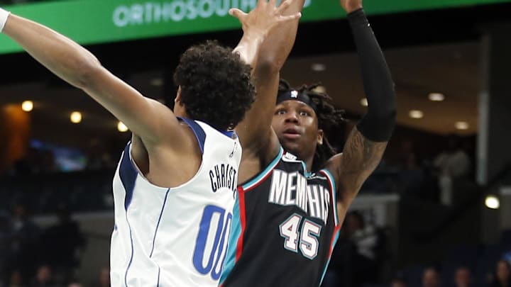 Mar 12, 2026; Memphis, Tennessee, USA; Memphis Grizzlies forward GG Jackson (45) shoots as Dallas Mavericks guard Max Christie (00) defends during the fourth quarter at FedExForum. Mandatory Credit: Petre Thomas-Imagn Images Mar 12, 2026; Memphis, Tennessee, USA; Memphis Grizzlies forward GG Jackson (45) shoots as Dallas Mavericks guard Max Christie (00) defends during the fourth quarter at FedExForum. Mandatory Credit: Petre Thomas-Imagn Images