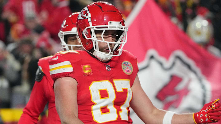 Jan 18, 2025; Kansas City, Missouri, USA; Kansas City Chiefs tight end Travis Kelce (87) reacts after catching a pass for a touchdown against the Houston Texans during the fourth quarter of a 2025 AFC divisional round game at GEHA Field at Arrowhead Stadium. Mandatory Credit: Denny Medley-Imagn Images