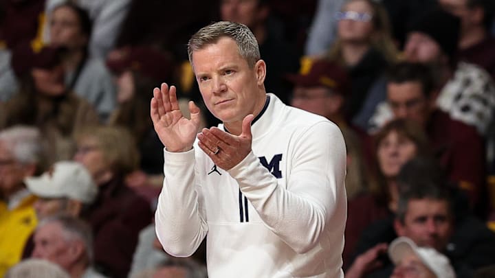Michigan Wolverines head coach Dusty May looks on during the second half against the Minnesota Golden Gophers at Williams Arena. Michigan Wolverines head coach Dusty May looks on during the second half against the Minnesota Golden Gophers at Williams Arena.