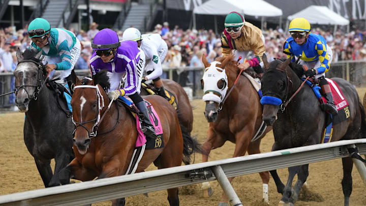 May 17, 2025; Baltimore, Maryland, USA; Clever Again (8) with Jose Ortiz up takes an early lead over Gosger (9) with Irad Ortiz Jr. up in the Preakness Stakes at Pimlico Race Course in Baltimore, MD.  