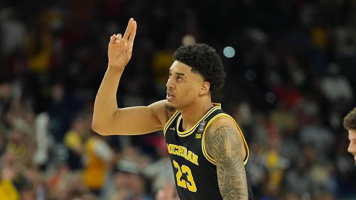 Apr 4, 2026; Indianapolis, IN, USA; Michigan Wolverines forward Yaxel Lendeborg (23) reacts against the Arizona Wildcats in the second half during a semifinal of the Final Four of the men's 2026 NCAA Tournament at Lucas Oil Stadium. Mandatory Credit: Robert Deutsch-Imagn Images