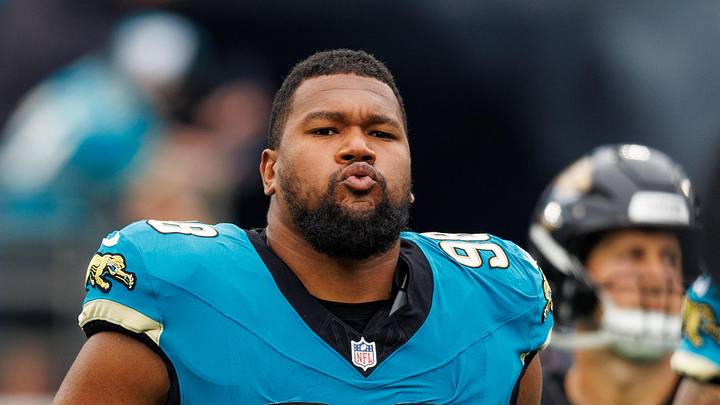 Jan 4, 2026; Jacksonville, Florida, USA; Jacksonville Jaguars defensive end Dawuane Smoot (98) runs out of the tunnel before the game against the Tennessee Titans at EverBank Stadium. Mandatory Credit: Morgan Tencza-Imagn Images
