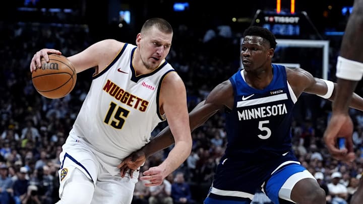 Mar 12, 2025; Denver, Colorado, USA; Minnesota Timberwolves guard Anthony Edwards (5) defends Denver Nuggets center Nikola Jokic (15) in the second half at Ball Arena. Mandatory Credit: Ron Chenoy-Imagn Images Mar 12, 2025; Denver, Colorado, USA; Minnesota Timberwolves guard Anthony Edwards (5) defends Denver Nuggets center Nikola Jokic (15) in the second half at Ball Arena. Mandatory Credit: Ron Chenoy-Imagn Images