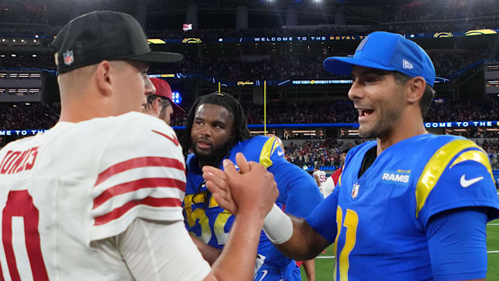 Oct 2, 2025; Inglewood, California, USA; San Francisco 49ers quarterback Mac Jones (10) reacts with Los Angeles Rams quarterback Jimmy Garoppolo (11) after the game against the Los Angeles Rams at SoFi Stadium. Mandatory Credit: Kirby Lee-Imagn Images Oct 2, 2025; Inglewood, California, USA; San Francisco 49ers quarterback Mac Jones (10) reacts with Los Angeles Rams quarterback Jimmy Garoppolo (11) after the game against the Los Angeles Rams at SoFi Stadium. Mandatory Credit: Kirby Lee-Imagn Images