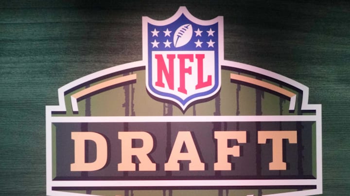 Apr 24, 2025; Green Bay, WI, USA;  The 2025 NFL Draft logo on the main stage at Lambeau Field. Mandatory Credit: Kirby Lee-Imagn Images
