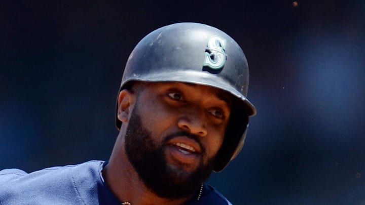 Seattle Mariners right fielder Domingo Santana (16) runs to third against the Los Angeles Angels during the first inning at Angel Stadium of Anaheim in 2019. 