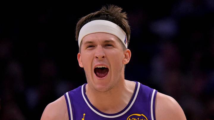 Feb 5, 2026; Los Angeles, California, USA;  Los Angeles Lakers guard Austin Reaves (15) reacts at the buzzer defeating the Philadelphia 76ers at Crypto.com Arena. Mandatory Credit: Jayne Kamin-Oncea-Imagn Images