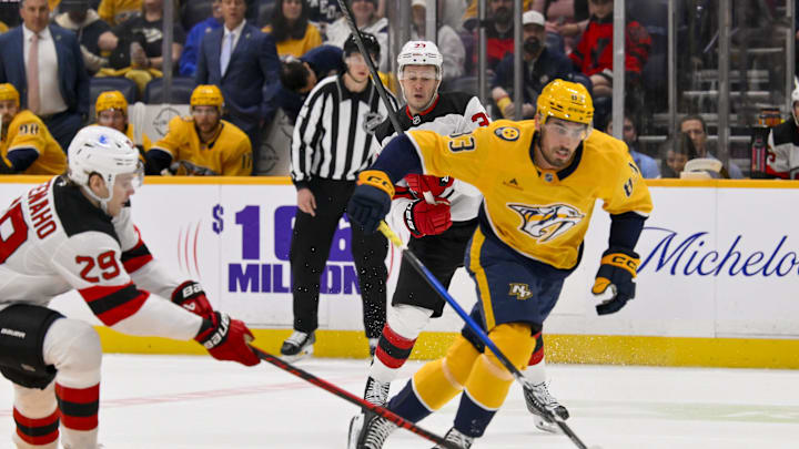 Mar 26, 2026; Nashville, Tennessee, USA; Nashville Predators defenseman Adam Wilsby (83) steals the puck from New Jersey Devils right wing Lenni Hameenaho (29) during the first period at Bridgestone Arena. Mandatory Credit: Steve Roberts-Imagn Images Mar 26, 2026; Nashville, Tennessee, USA; Nashville Predators defenseman Adam Wilsby (83) steals the puck from New Jersey Devils right wing Lenni Hameenaho (29) during the first period at Bridgestone Arena. Mandatory Credit: Steve Roberts-Imagn Images