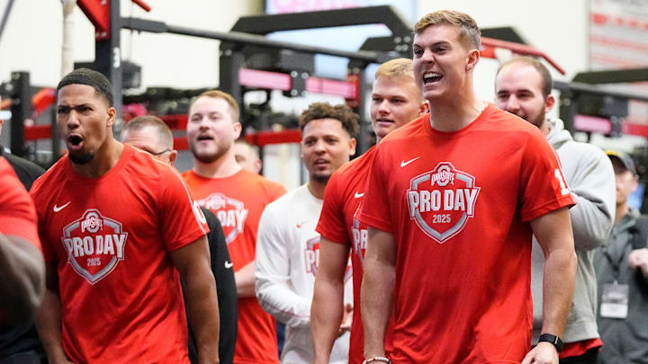 Ohio State Buckeyes quarterback Will Howard and linebacker Cody Simon react in the weight room during the pro day for NFL scouts at the Woody Hayes Athletic Center on March 26, 2025. Ohio State Buckeyes quarterback Will Howard and linebacker Cody Simon react in the weight room during the pro day for NFL scouts at the Woody Hayes Athletic Center on March 26, 2025.