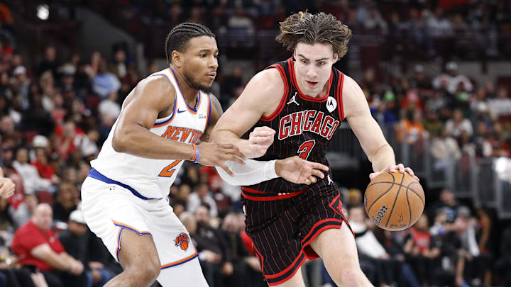 Oct 31, 2025; Chicago, Illinois, USA; Chicago Bulls guard Josh Giddey (3) drives to the basket against New York Knicks guard Miles McBride (2) during the first half at United Center. Mandatory Credit: Kamil Krzaczynski-Imagn Images Oct 31, 2025; Chicago, Illinois, USA; Chicago Bulls guard Josh Giddey (3) drives to the basket against New York Knicks guard Miles McBride (2) during the first half at United Center. Mandatory Credit: Kamil Krzaczynski-Imagn Images